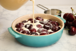 Summer Cherries - Pouring the Batter in the Dish for Cherry Clafoutis